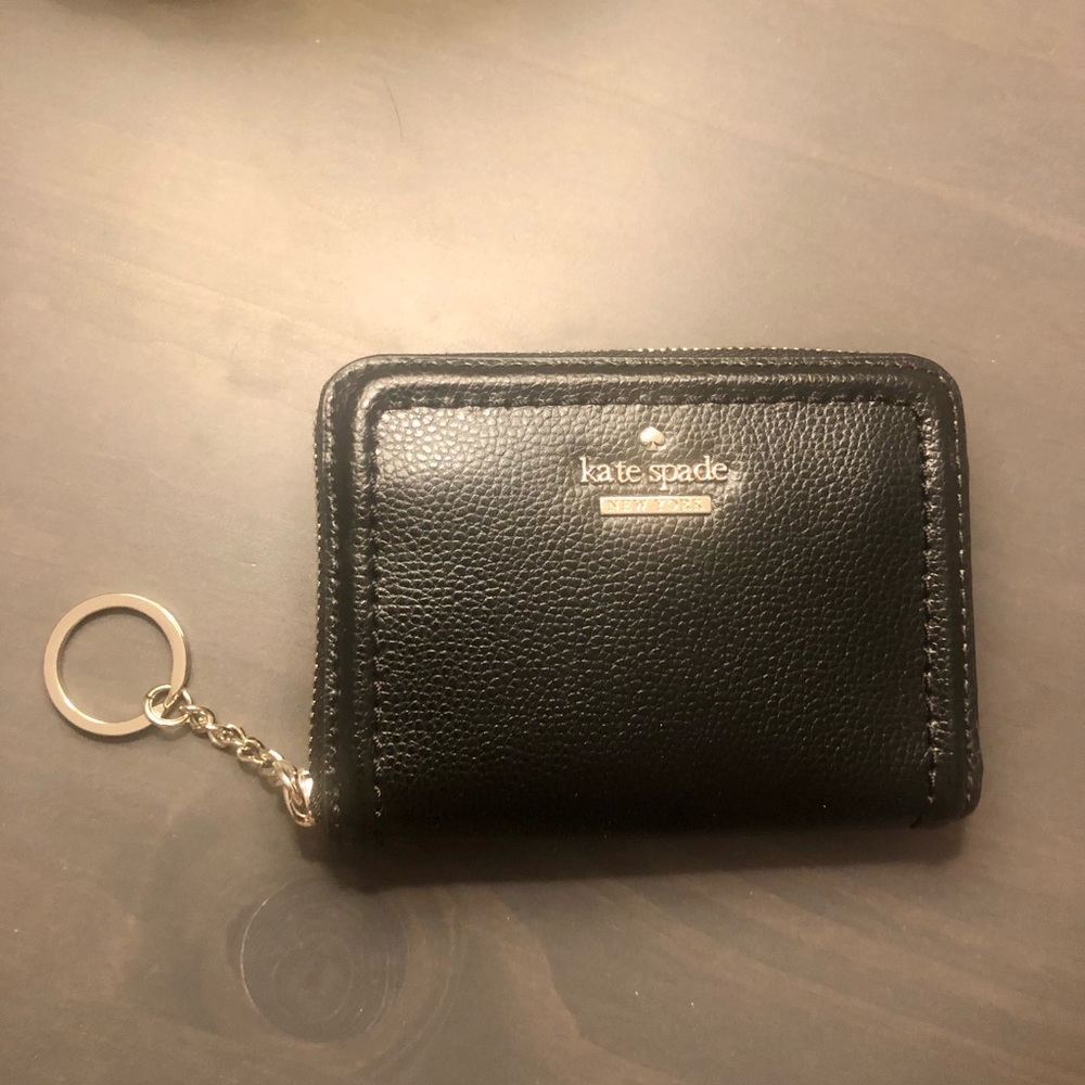 NWT rare Kate Spade NY black key chain 100% leather zipper wallet.